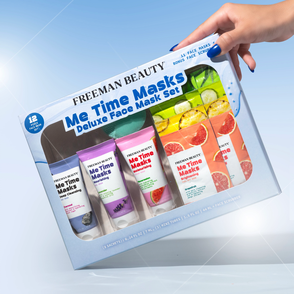 Me Time face mask set box with multiple mask sachets and tubes inside, held up by hand