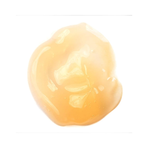 Light yellow facial mask gel disc with glossy smooth surface