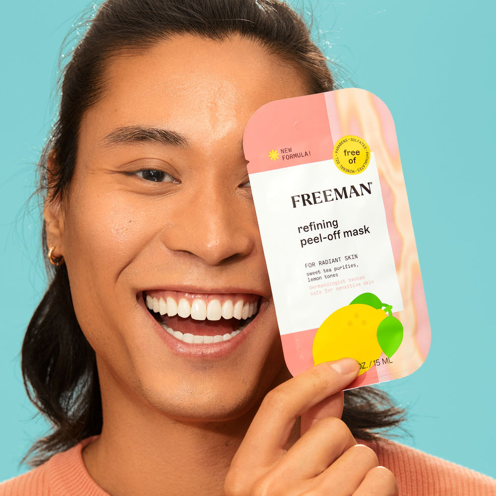 Facial mask bundle with three FREEMAN peel-off packets: pink, blue, and black.