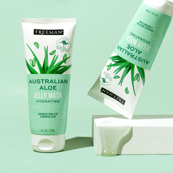 Freeman Beauty Exotic Blends Hydrating Australian Aloe Jelly Mask tubes on a green background
