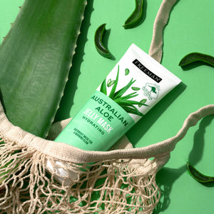 Freeman Beauty Exotic Blends Hydrating Australian Aloe Jelly Mask in a mesh bag with fresh aloe vera slices
