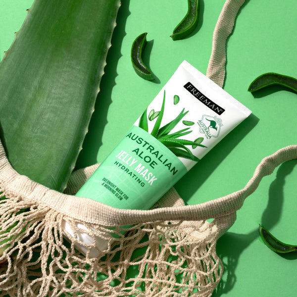 Freeman Beauty Exotic Blends Hydrating Australian Aloe Jelly Mask in a mesh bag with fresh aloe vera slices