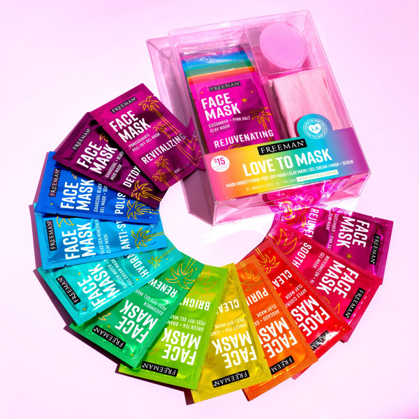 Assorted Freeman face mask packets around a clear tray featuring a round pink applicator pad