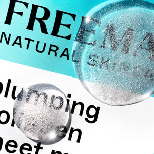 Close-up of Freeman plumping collagen sheet mask text on teal pouch