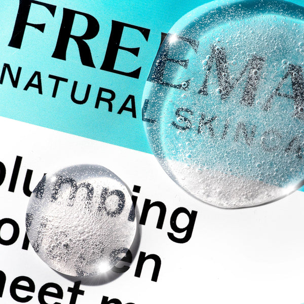 Close-up of Freeman plumping collagen sheet mask text on teal pouch
