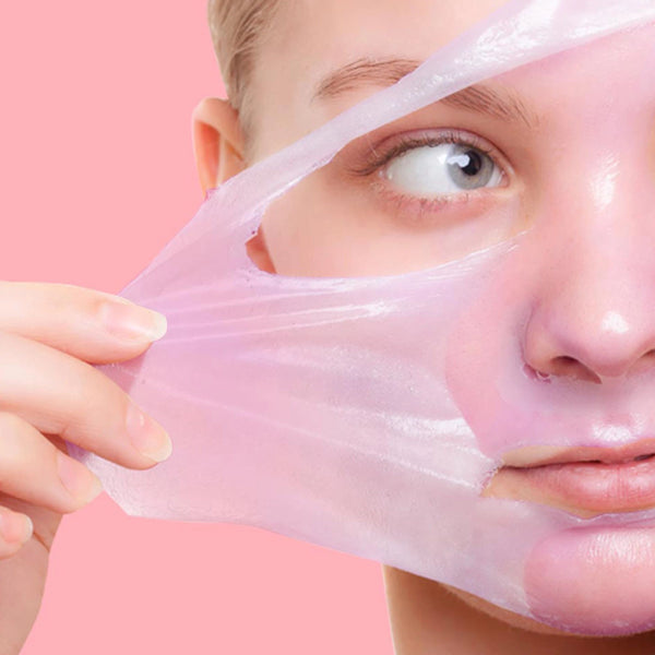 Peel-off gel mask applied on face, forming a thin translucent layer