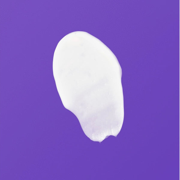 Thick white cream swatch on a smooth surface