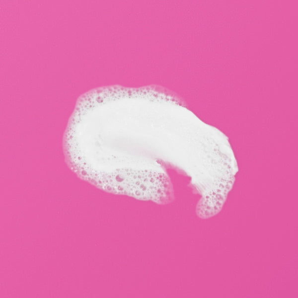 Foamy white cleanser residue with bubble texture