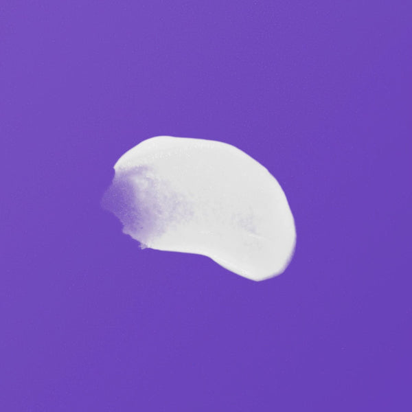 White eye cream gel smear on a solid background