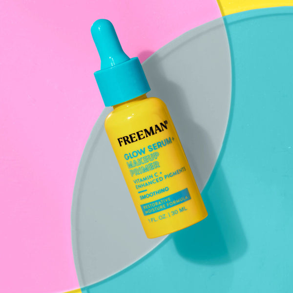 Glow serum and makeup primer bottle with teal dropper over a gray dish