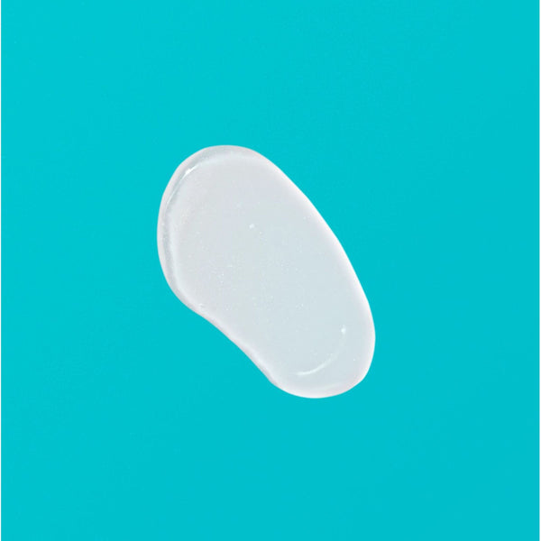 Clear gel serum swatch on a light surface