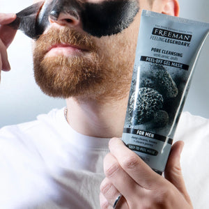 Man applying volcanic ash peel-off gel mask to beard area; tube shown in hand
