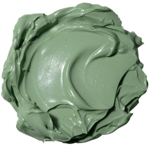 Thick green matcha cream mask smear in a round scoop