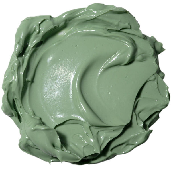 Thick green matcha cream mask smear in a round scoop